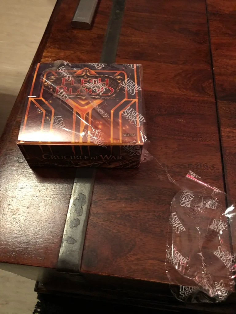 Sealed Flesh and Blood Crucible of War First Edition display before opening, December 2020
